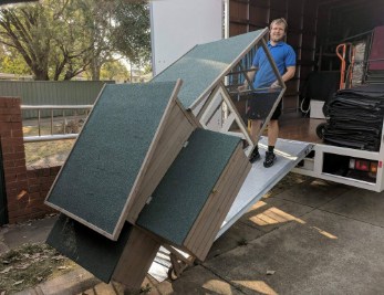 expert Sydney removalists & storage - loading boxes onto truck